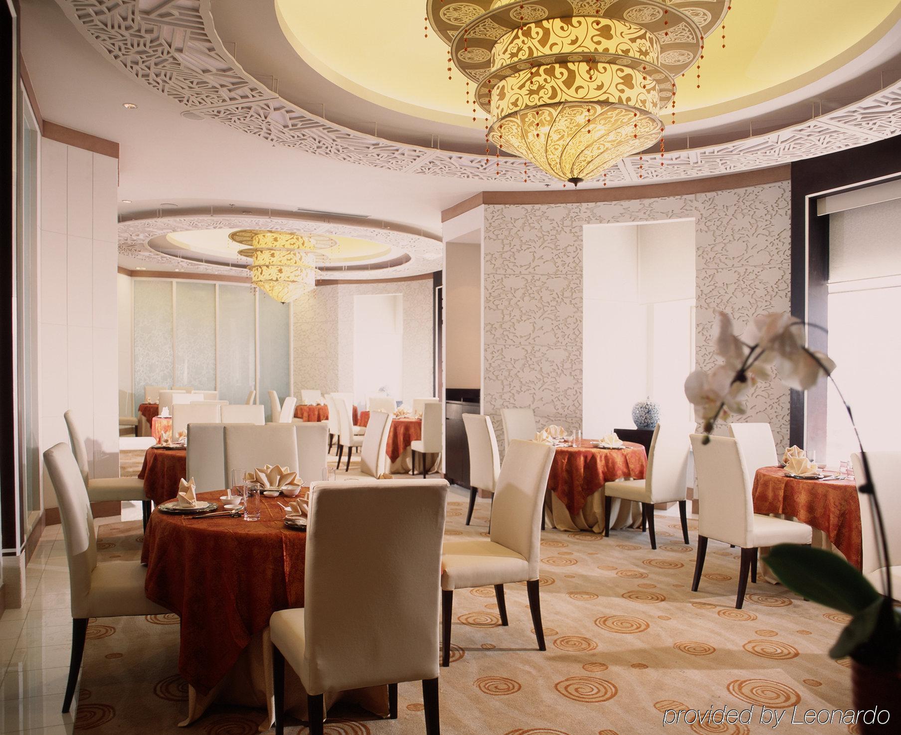 Hotel Nikko Tianjin Buitenkant foto The restaurant