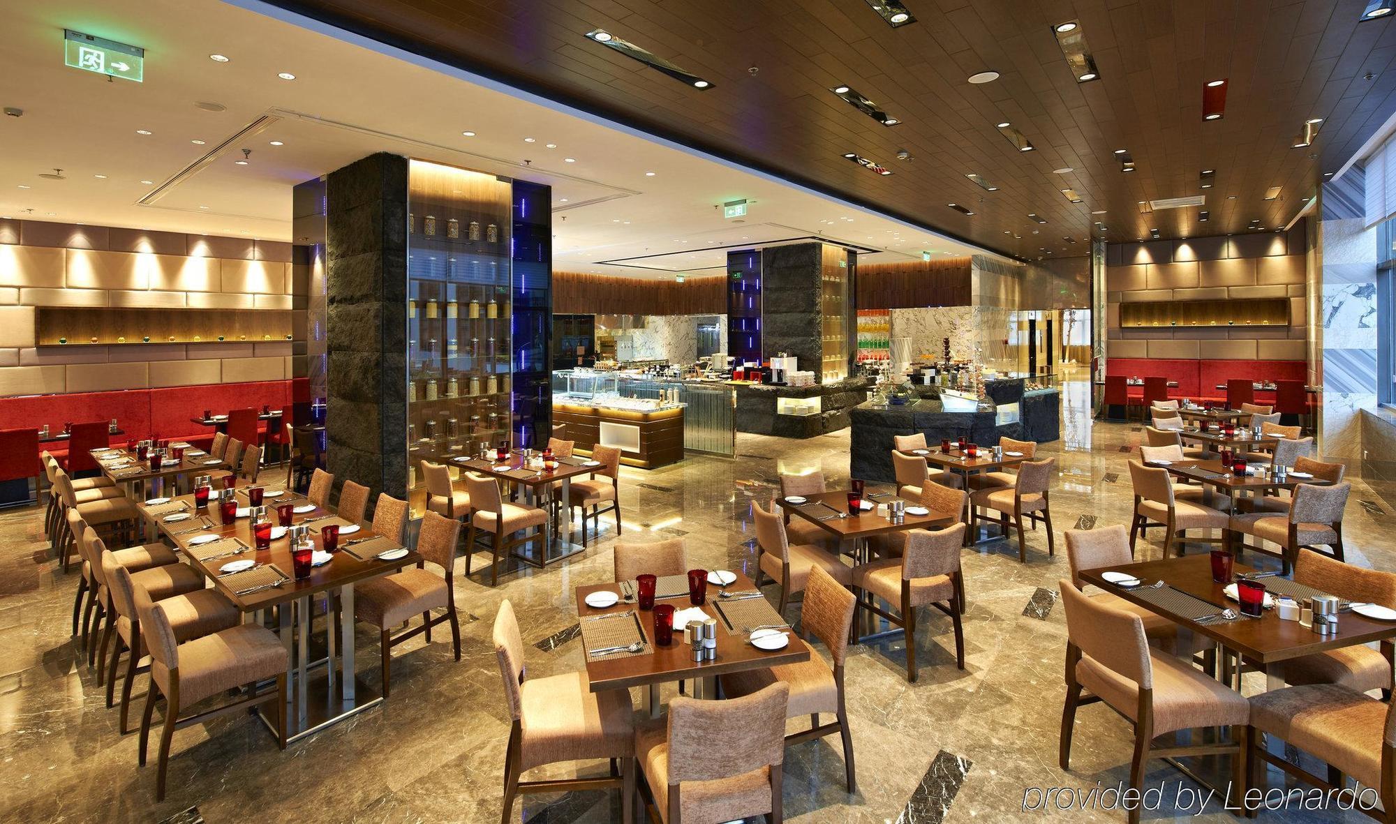 Hotel Nikko Tianjin Buitenkant foto The restaurant